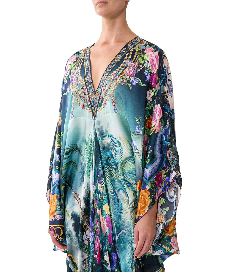 Embrace luxury in the CAMILLA Basked In Baroque Long Kaftan 00037787, featuring ornate baroque prints, flowing silk, and a relaxed, elegant silhouette.