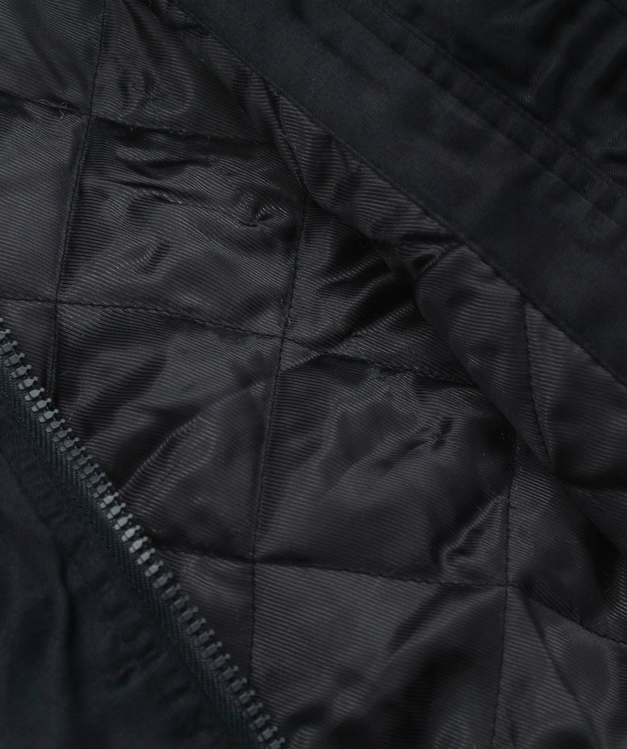 MAHARISHI Tour Jacket B22MH5220 features signature embroidery on a classic souvenir silhouette, blending military style with sustainable design.