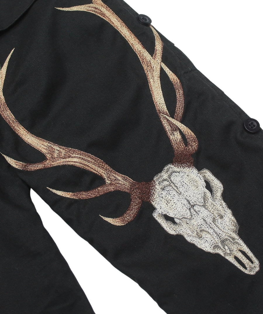 The Maharishi Boy's Antlers Snopants 5612 feature antler embroidery, adjustable fit, and durable fabric—perfect for bold style and everyday comfort.