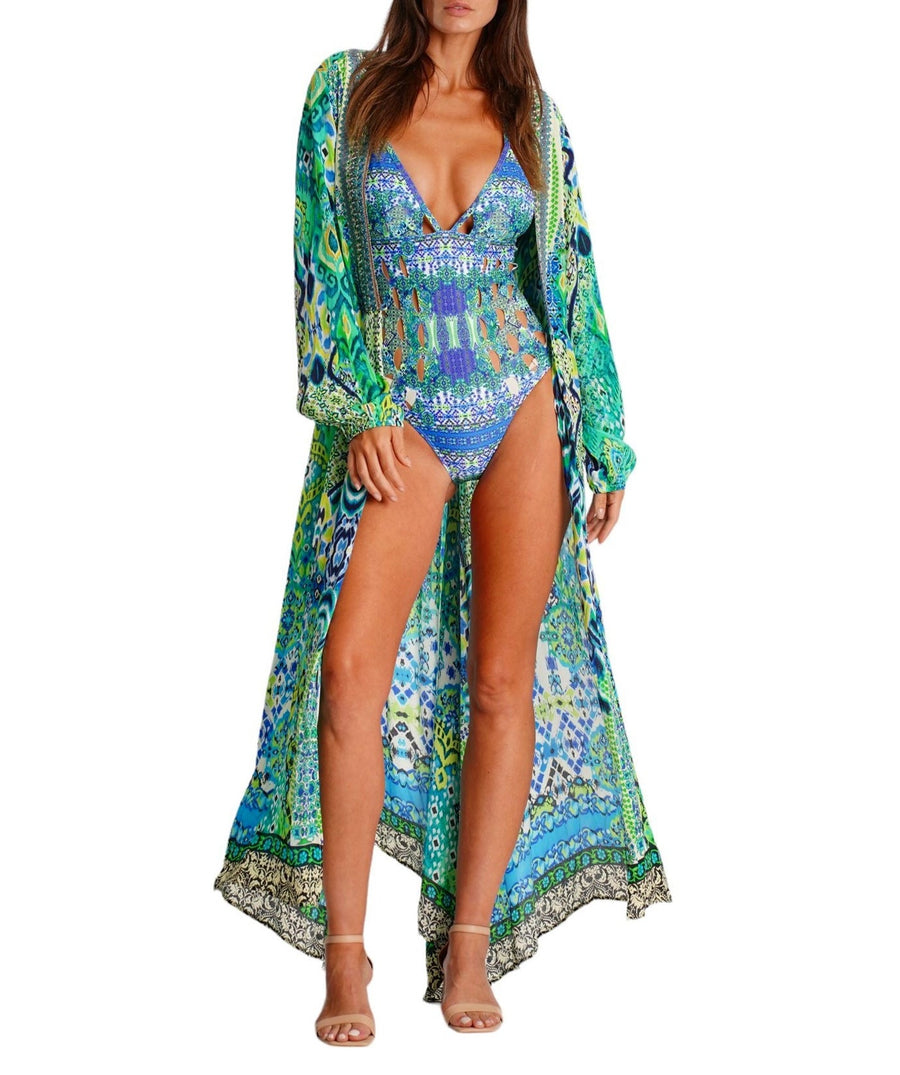 LA MODA Nile River Long Cape 25008 BC – A stylish and flowing long cape featuring a vibrant design, lightweight fabric, and an elegant drape, perfect for layering and resort wear