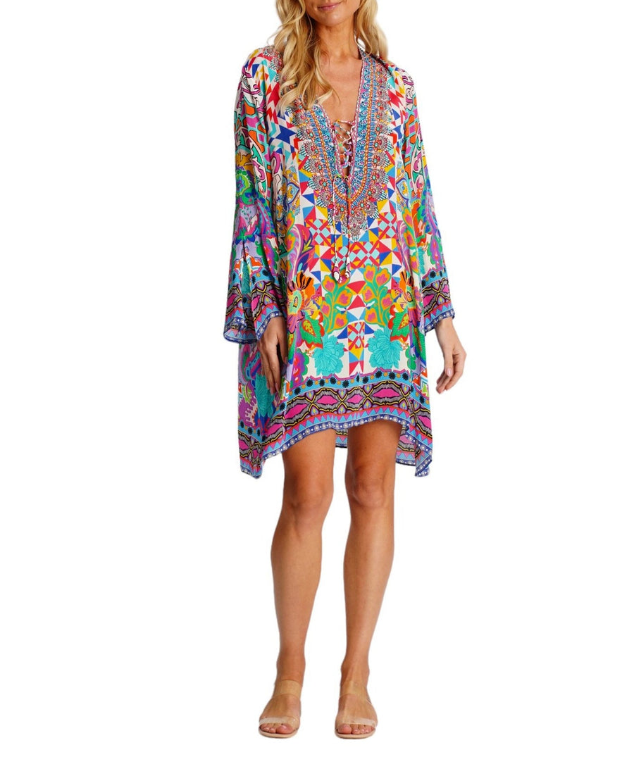 LA MODA Psychedelic Pattern Mid-Length Dress 25033 MC – A bold and vibrant mid-length dress featuring a mesmerizing psychedelic print, lightweight fabric, and a flattering fit, perfect for standout summer style