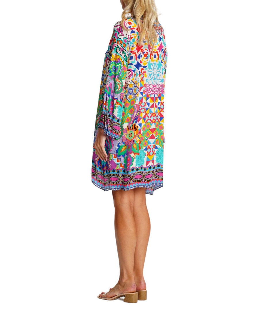 LA MODA Psychedelic Pattern Mid-Length Dress 25033 MC – A bold and vibrant mid-length dress featuring a mesmerizing psychedelic print, lightweight fabric, and a flattering fit, perfect for standout summer style