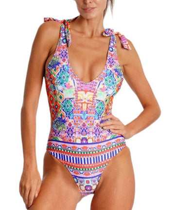 Tropical floral Sea Garden one piece featuring deep V-neck with ring, adjustable halter straps, and crisscross back. Comfortable fabric ideal for pool or beach.