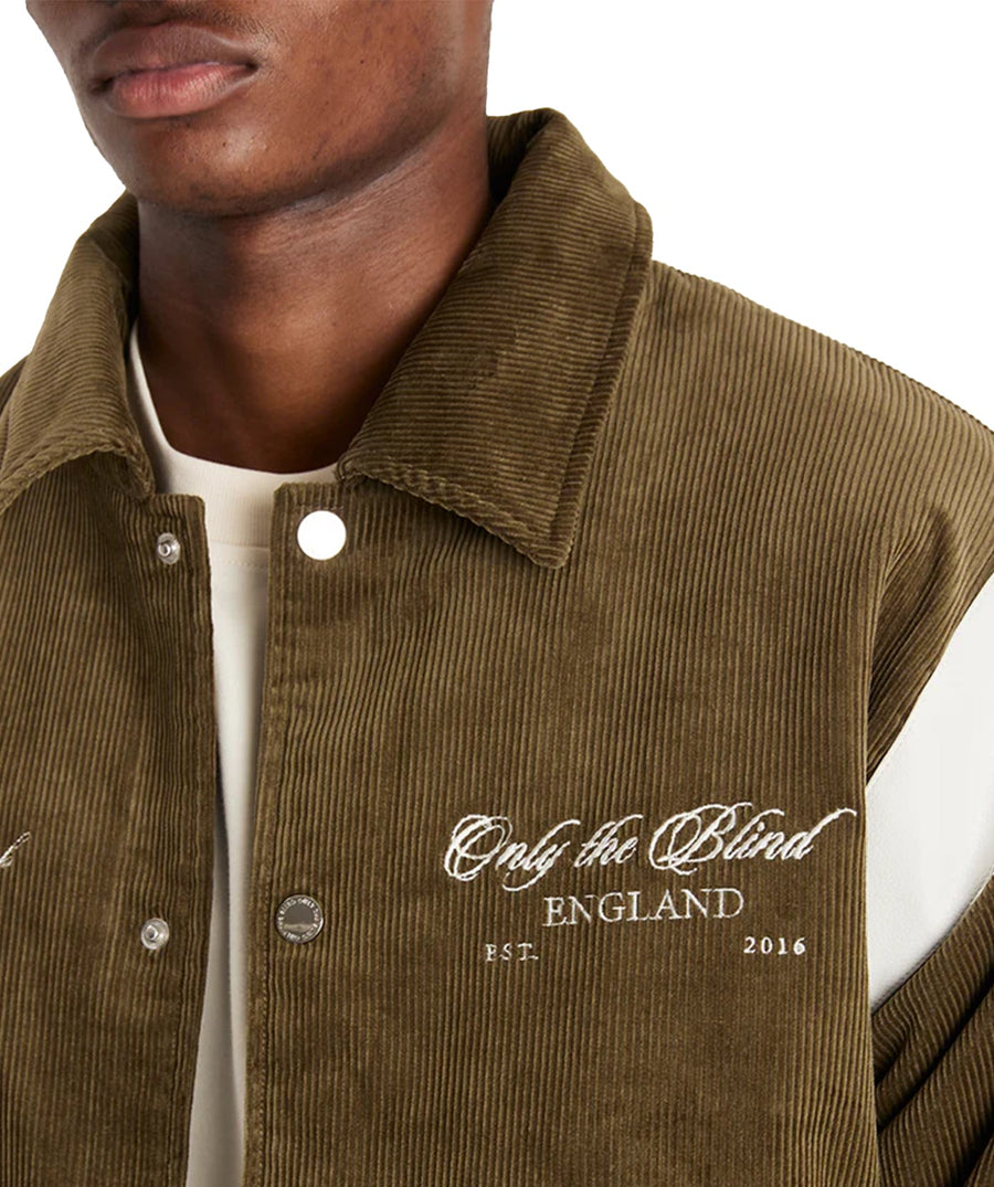 Stand out in the ONLY THE BLIND Blake’s Members Club Varsity Jacket OTBX-O1442 – a bold fusion of luxury design, premium fabrics, and streetwear style.