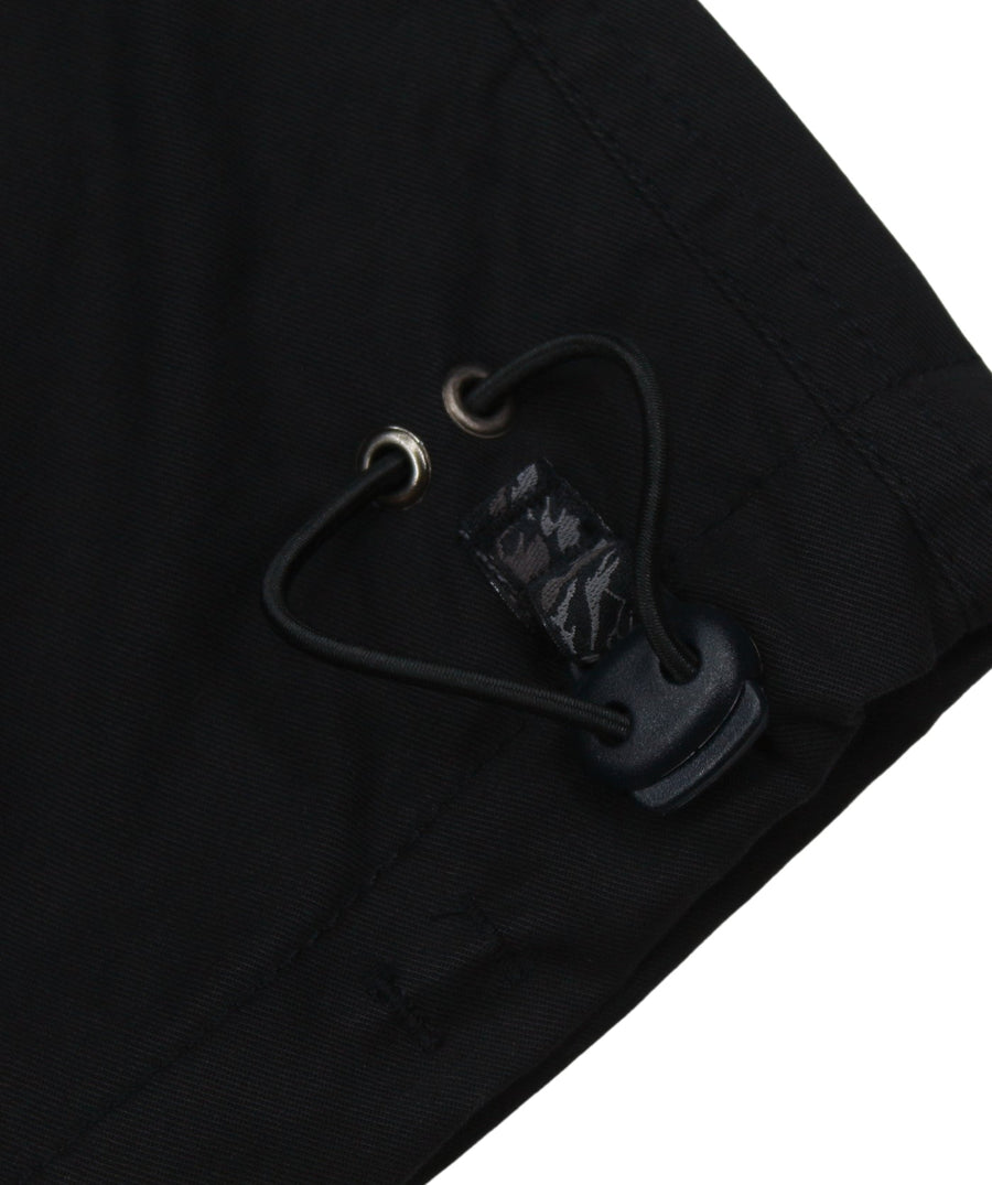 The Maharishi Kid's Tiger Snopants 5508 feature bold tiger embroidery, adjustable waistband, and durable fabric—perfect for stylish, everyday adventure.