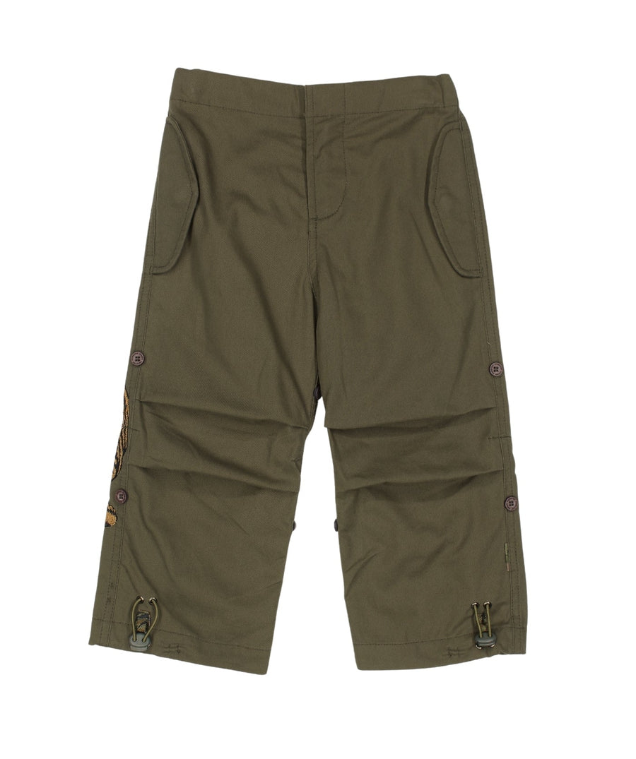 The Maharishi Kid's Tiger Snopants 5508 feature bold tiger embroidery, adjustable waistband, and durable fabric—perfect for stylish, everyday adventure.
