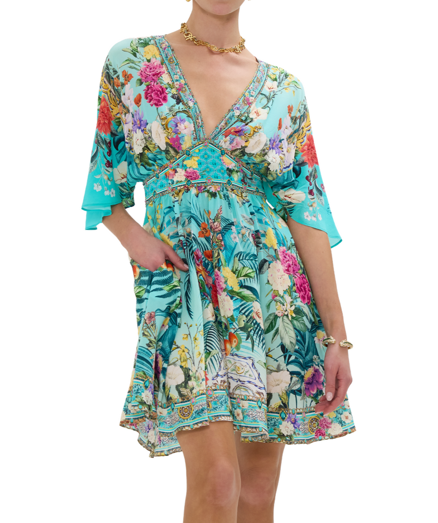 CAMILLA Gardens Of Queluz Short Dress 00033238 – A vibrant short dress adorned with a regal garden-inspired print, featuring a flattering cut and luxe fabric