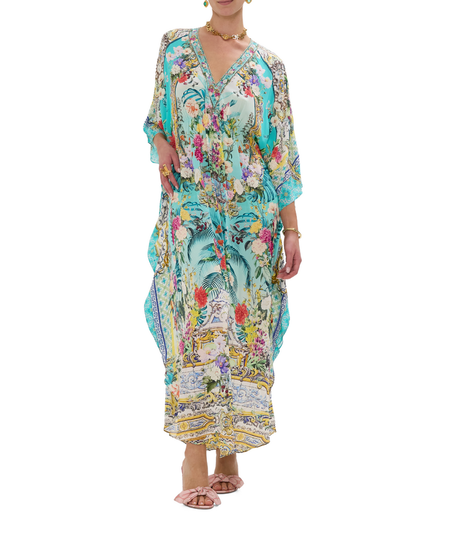 CAMILLA Gardens Of Queluz Long Kaftan 00033593 – A luxurious long kaftan showcasing an opulent garden-inspired print, flowing silhouette, and elegant crystal details.