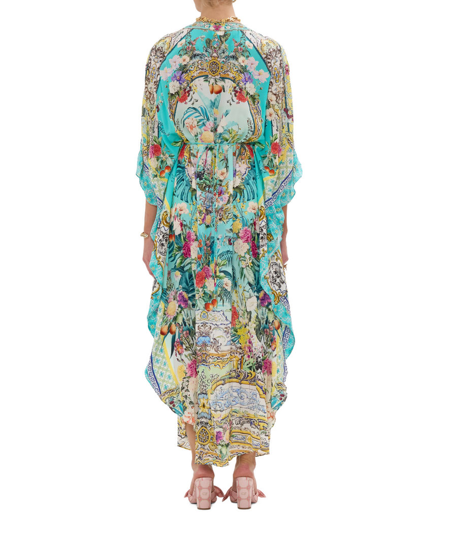 CAMILLA Gardens Of Queluz Long Kaftan 00033593 – A luxurious long kaftan showcasing an opulent garden-inspired print, flowing silhouette, and elegant crystal details.