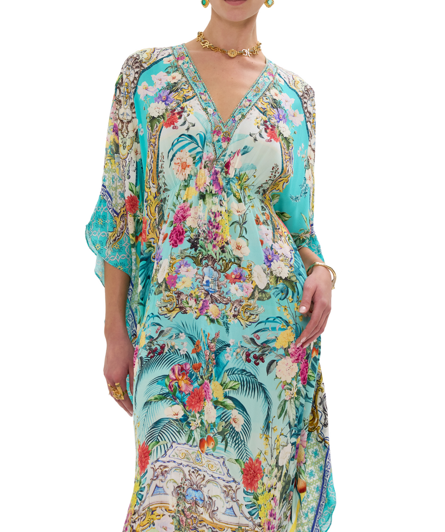 CAMILLA Gardens Of Queluz Long Kaftan 00033593 – A luxurious long kaftan showcasing an opulent garden-inspired print, flowing silhouette, and elegant crystal details.