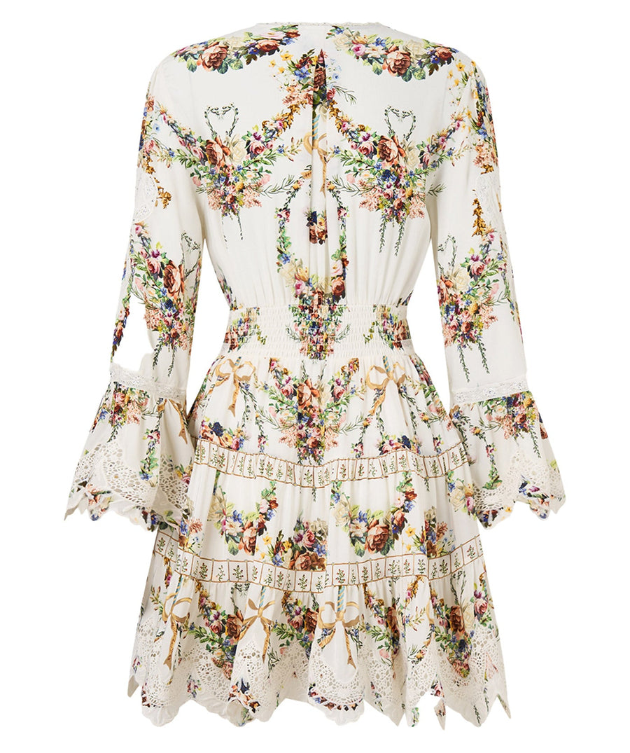 Own the spotlight in the CAMILLA Dressing Room Drama Short Dress 00034739 – a bold, theatrical print meets a flirty silhouette for standout style.