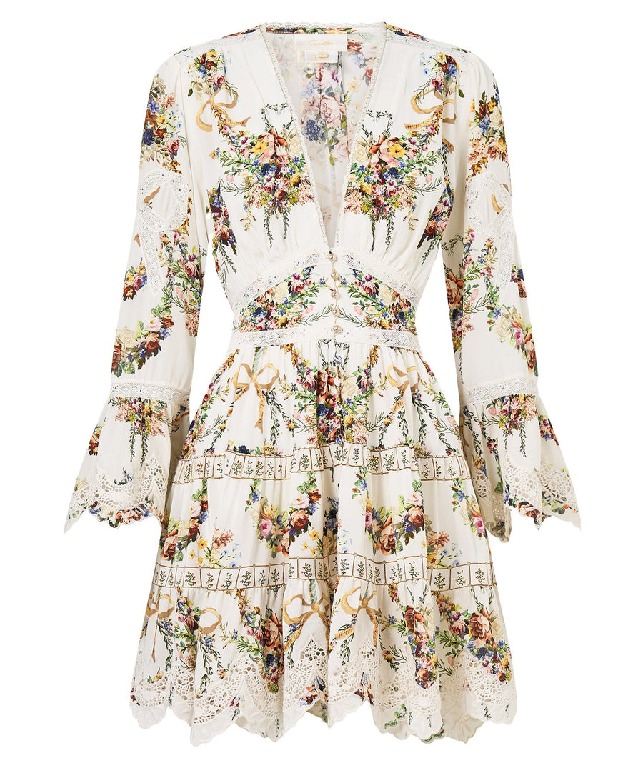 Own the spotlight in the CAMILLA Dressing Room Drama Short Dress 00034739 – a bold, theatrical print meets a flirty silhouette for standout style.