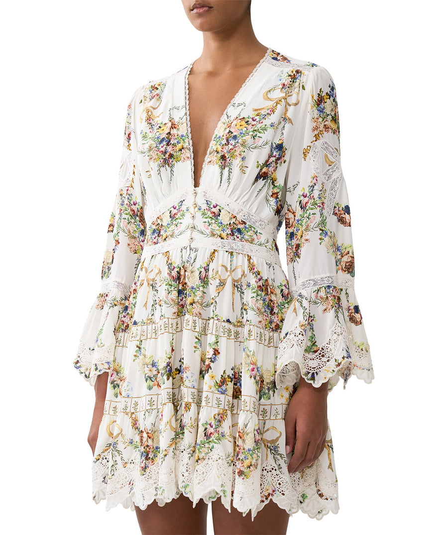 Own the spotlight in the CAMILLA Dressing Room Drama Short Dress 00034739 – a bold, theatrical print meets a flirty silhouette for standout style.