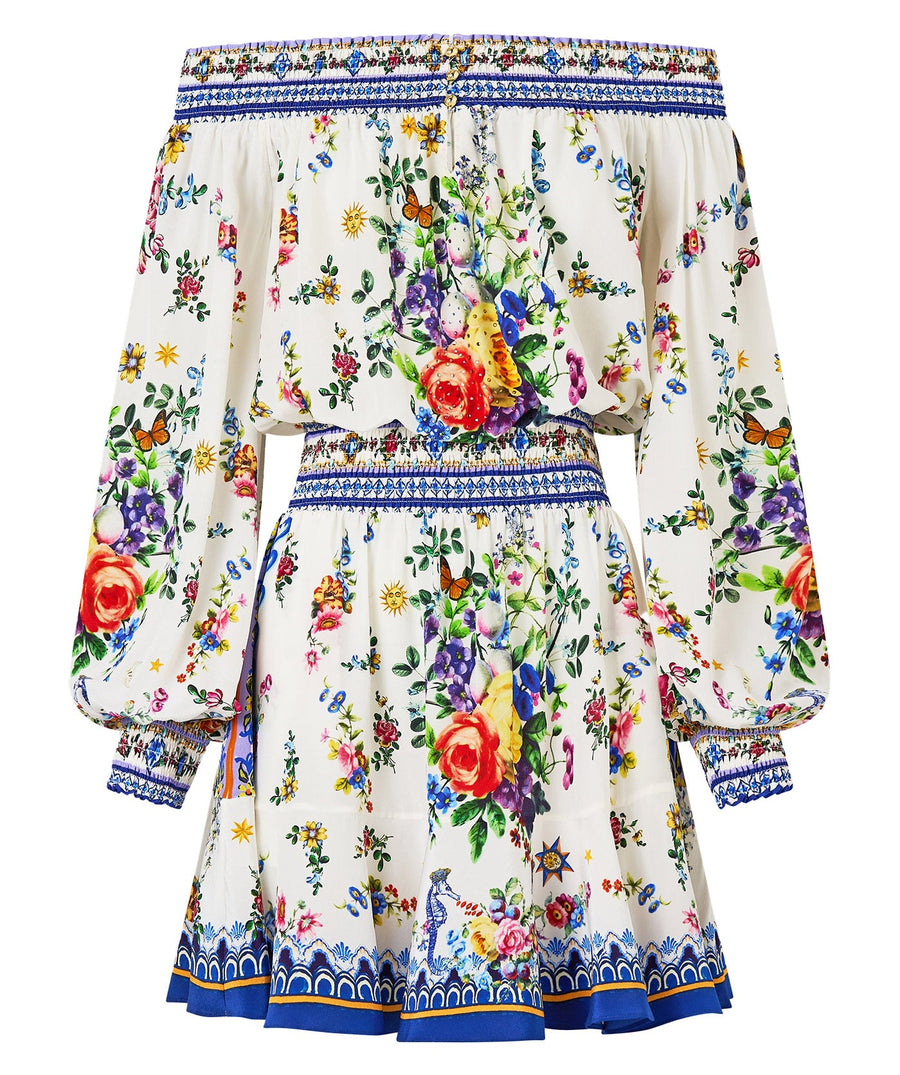 Chic and playful, the CAMILLA Tiles Darls Off Shoulder Short Dress 00035220 features bold prints and flirty ruffles—perfect for sunny days and summer nights.