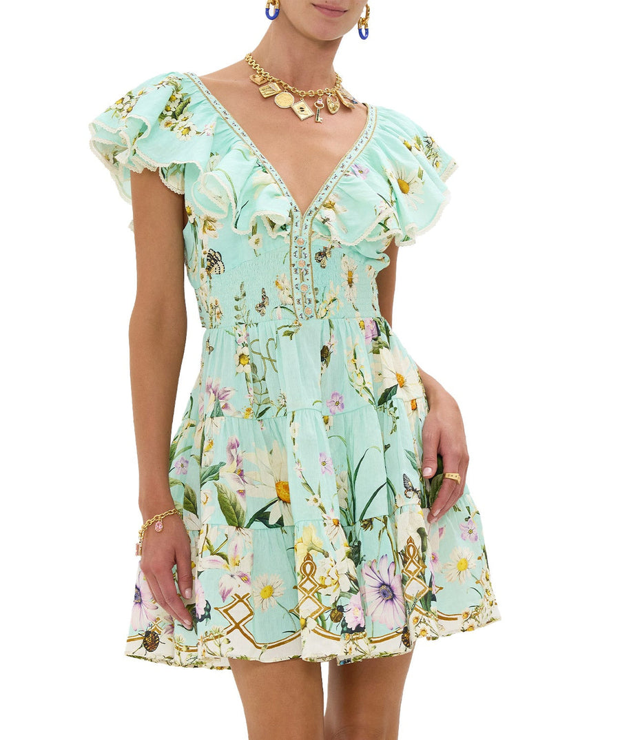 Step into sunshine with the CAMILLA Floral Freefall Short Dress 00035363 – a vibrant, playful piece with bold blooms and a breezy, feminine silhouette