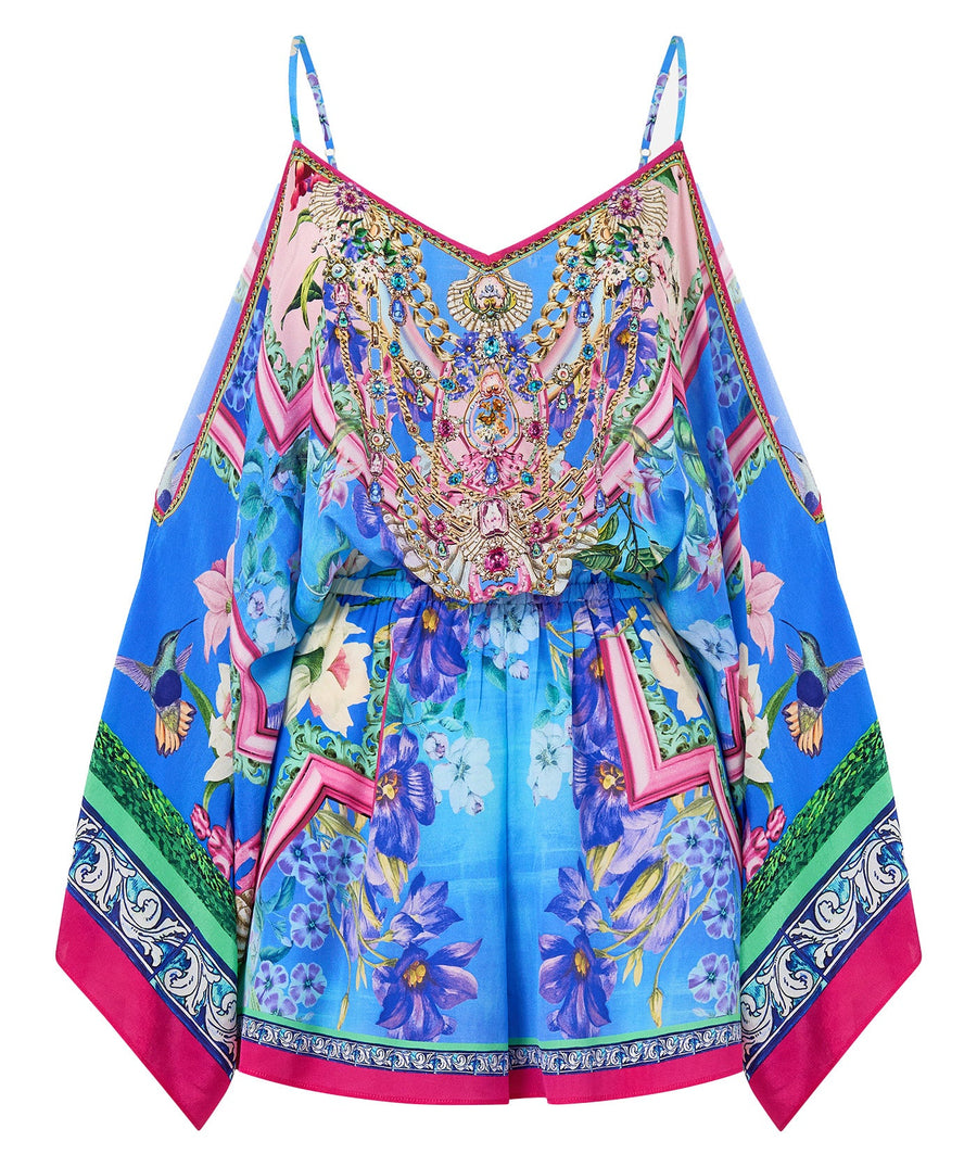 Step into effortless glam with the CAMILLA Spirit Of Santa Maria Drop Shoulder Playsuit 00035442 – bold prints meet relaxed elegance in this luxe resort piece