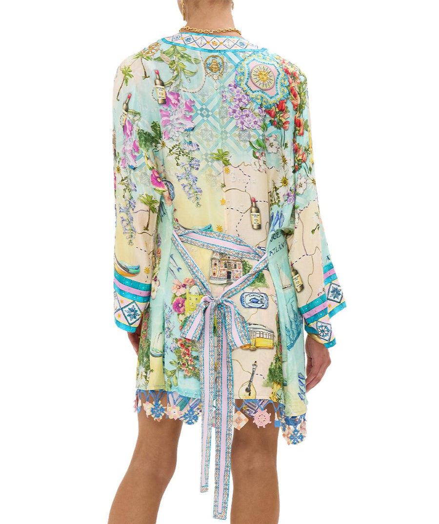Embrace coastal charm in the CAMILLA Just Coasting Short Kimono Wrap 00035638, featuring oceanic prints, luxe silk, and a relaxed fit for effortless style.