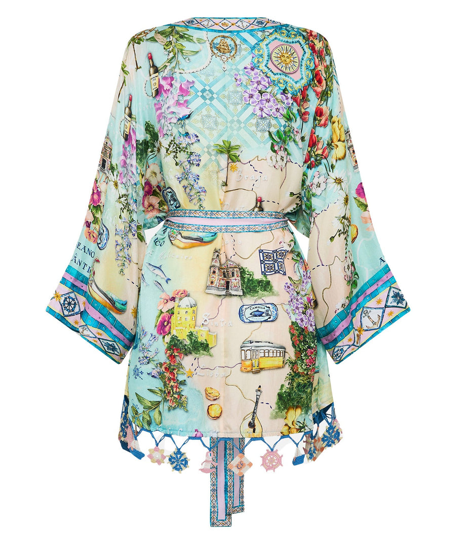 Embrace coastal charm in the CAMILLA Just Coasting Short Kimono Wrap 00035638, featuring oceanic prints, luxe silk, and a relaxed fit for effortless style.