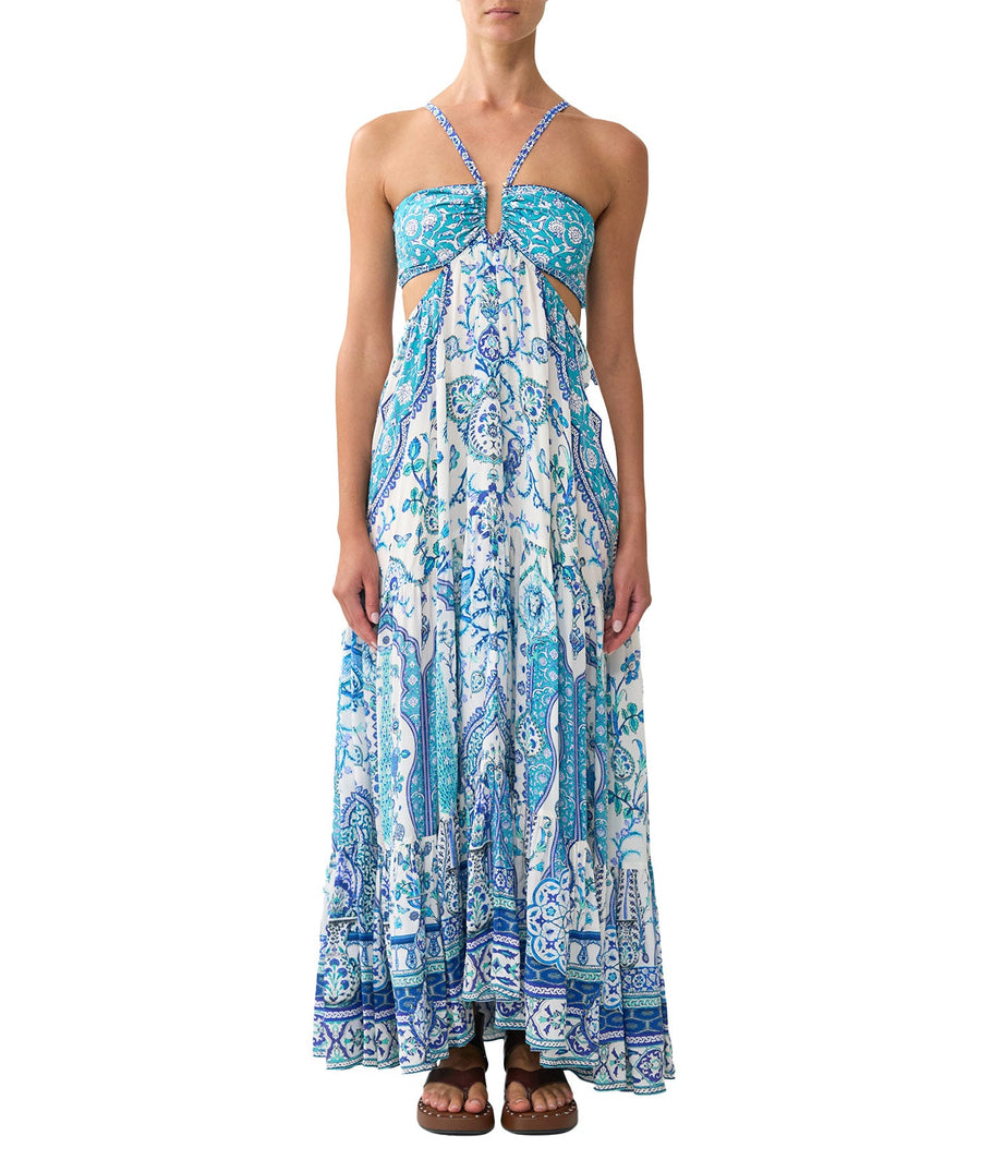 The CAMILLA Isnik Lullaby Cut Out Dress 00036545 showcases bold prints, waist cut-outs, and crystal embellishments—perfect for statement summer style.