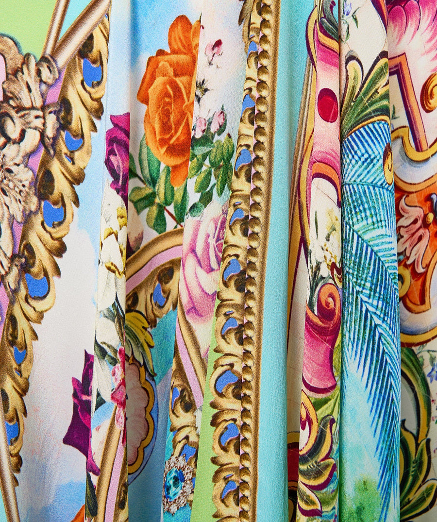 Radiate elegance in the CAMILLA Spirit Of Santa Maria Long Dress 00037785 – a statement piece featuring flowing lines, bold prints, and timeless resort charm.