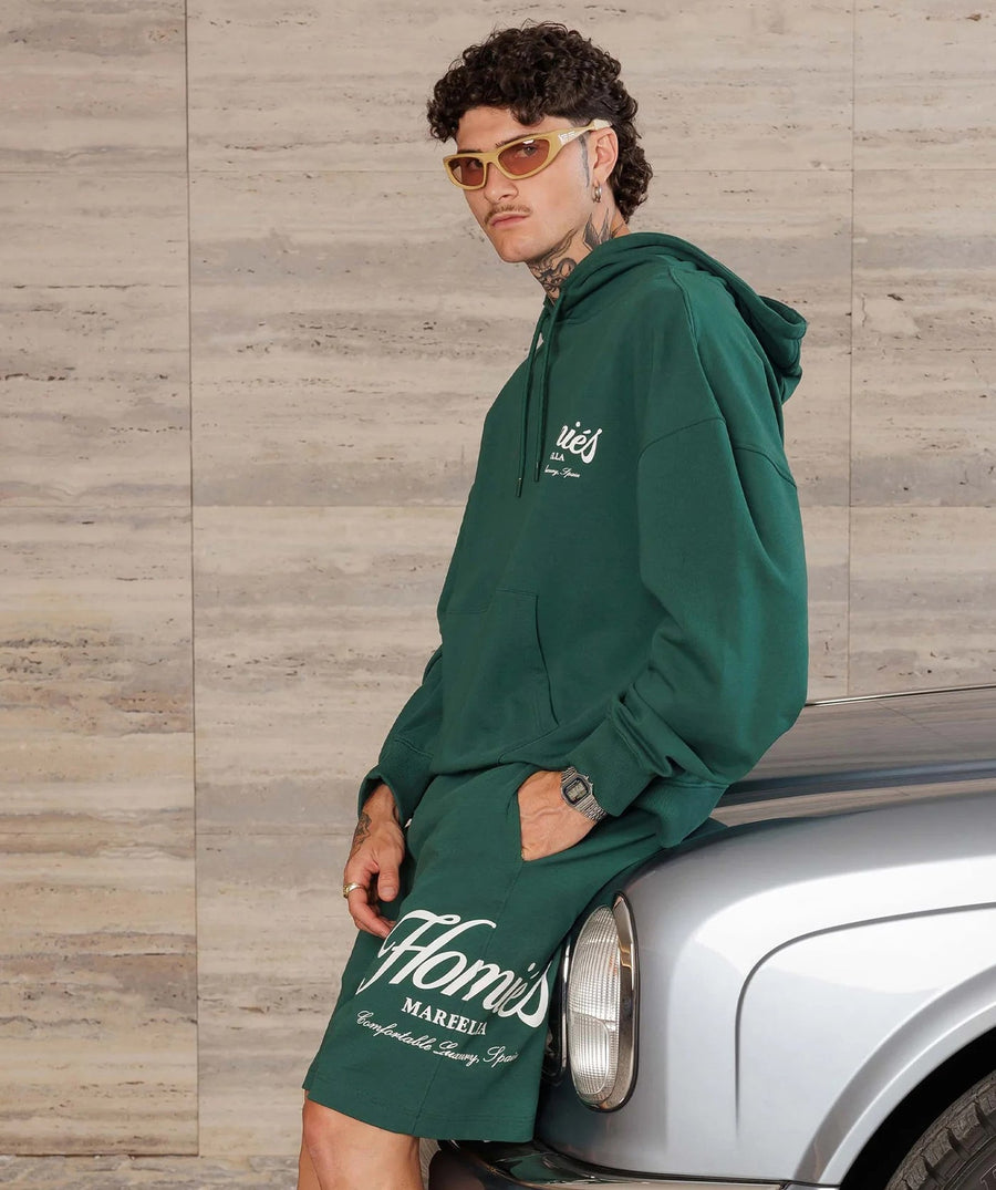 HOMIES MARBELLA Essentials Varsity Hoodie FW25.H01.009 – luxe varsity-inspired streetwear hoodie, blending comfort and style for a bold everyday look.