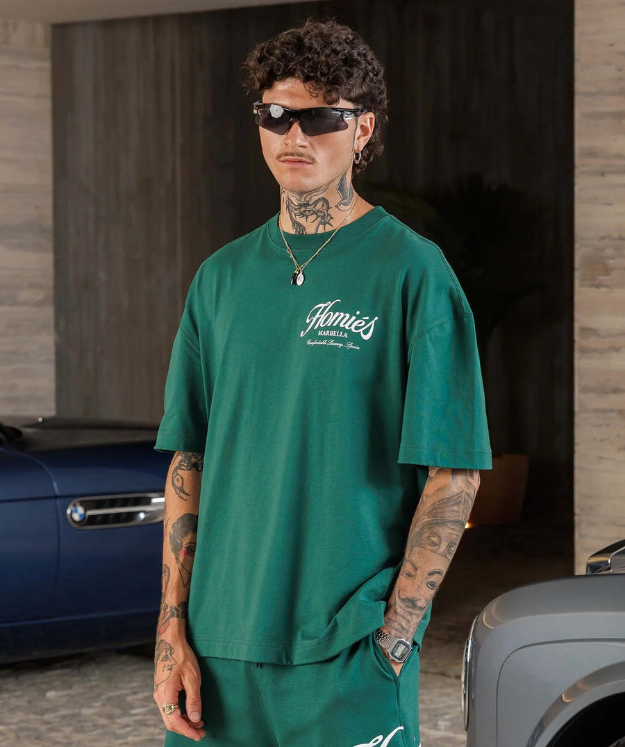 HOMIES MARBELLA Essentials Varsity T-Shirt FW25.H03.046 – premium cotton tee with varsity-inspired design, perfect for elevated casual and streetwear looks.