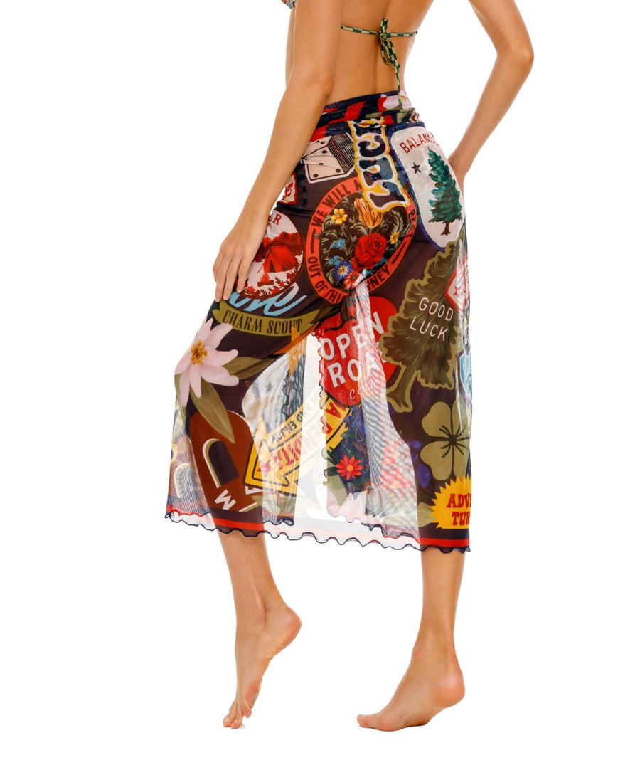 AGUA BENDITA Marine Bosco Pareo 18276 – A versatile pareo adorned with the vibrant Tales print, crafted from lightweight fabric for elegant beachside styling