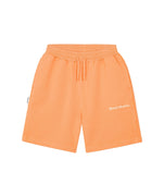 HOMIES MARBELLA vintage orange shorts featuring logo print, taglio stitching, side and back pockets, and an oversized fit for everyday comfort.