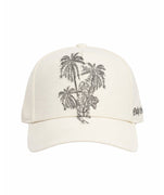 Features detailed tiger and palm embroidery on natural undyed canvas with tonal logo, curved brim, and adjustable fit. A versatile standout from the Sandstorm line.