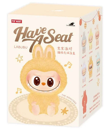 Meet LABUBU Version 2 Have A Seat K67LBUV2 – a whimsical collectible figure showcasing playful charm and detail, perfect for designer toy enthusiasts.