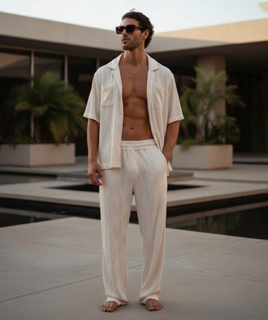 Lightweight 3D-wave textured matching set with relaxed shirt, pockets, and elastic-waist pants. Perfect for travel, beach days, lounging, or warm-weather style.