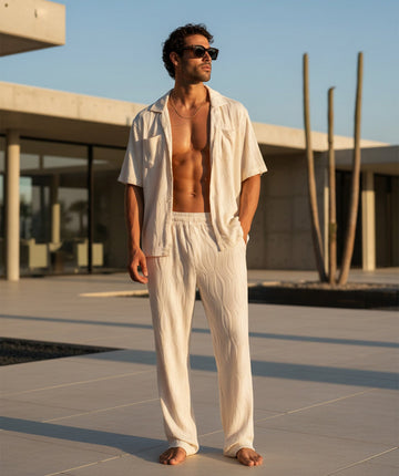 Lightweight 3D-wave textured matching set with relaxed shirt, pockets, and elastic-waist pants. Perfect for travel, beach days, lounging, or warm-weather style.