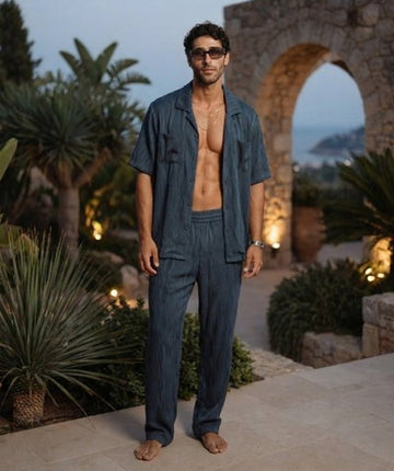 Soft, breathable wave-textured set with a camp-collar shirt, pockets, and comfy elastic pants. Ideal for vacations, resort looks, and relaxed everyday outfits.